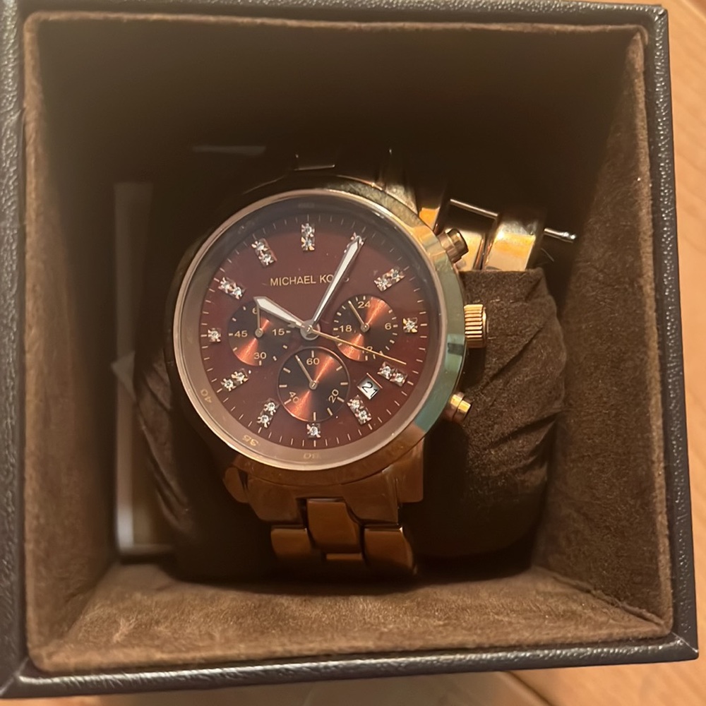 Michael Kors Rose gold with brown face large women's watch.